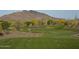 Expansive golf course with desert landscaping and mountain views at 37200 N Cave Creek Rd # 1002, Scottsdale, AZ 85262