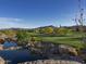 Serene water feature with desert landscaping and mountain views at 37200 N Cave Creek Rd # 1002, Scottsdale, AZ 85262