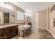 Luxurious bathroom with double vanity and a large soaking tub at 10331 E Starion Ave, Mesa, AZ 85212