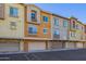 Building exterior showcasing multiple units and garages at 2150 W Alameda Rd # 1327, Phoenix, AZ 85085