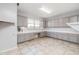Laundry room with ample counter and cabinet space at 9645 E Theia Dr, Mesa, AZ 85212