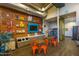 Community room with tables, chairs, and vending machines at 9645 E Theia Dr, Mesa, AZ 85212