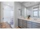 Bathroom with double vanity and shower/tub combo at 9645 E Theia Dr, Mesa, AZ 85212