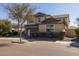 Two-story house with a large garage and well-manicured landscaping at 9645 E Theia Dr, Mesa, AZ 85212