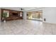 Open living area with tile floors and access to the backyard at 9645 E Theia Dr, Mesa, AZ 85212