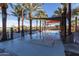 Community water feature with shade structures and seating at 9645 E Theia Dr, Mesa, AZ 85212