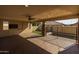 Spacious covered patio with wood-like tile flooring, ceiling fan, and views of the pool at 9645 E Theia Dr, Mesa, AZ 85212