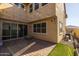 Charming backyard patio with string lights and a table at 9645 E Theia Dr, Mesa, AZ 85212