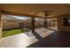 Covered patio overlooking the pool and backyard at 9645 E Theia Dr, Mesa, AZ 85212