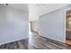 Spacious bedroom with wood-look flooring and access to a private patio at 9645 E Theia Dr, Mesa, AZ 85212