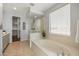 Bathroom features a large soaking tub and walk-in shower at 9645 E Theia Dr, Mesa, AZ 85212