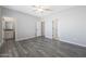 Primary bedroom with ensuite bathroom and gray flooring at 10333 N 115Th Ave, Youngtown, AZ 85363