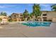 Inviting community pool with lounge chairs and landscaping at 1333 E Morten Ave # 127, Phoenix, AZ 85020