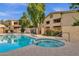 Refreshing community pool and spa with surrounding patio at 1333 E Morten Ave # 127, Phoenix, AZ 85020