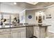 Kitchen features granite counters and light cabinets at 7601 E Indian Bend Rd # 3002, Scottsdale, AZ 85250