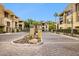 Community entrance with gated access and landscaping at 7601 E Indian Bend Rd # 3002, Scottsdale, AZ 85250