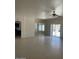 Living area with tile floors and sliding doors at 10235 W Georgia Ave, Glendale, AZ 85307