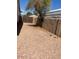 Side yard with gravel and a tree at 10235 W Georgia Ave, Glendale, AZ 85307