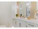 Modern powder room with gold accents and geometric tile at 27225 N 71St Pl, Scottsdale, AZ 85266