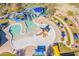 Community pool with a winding water slide and play area at 42424 N Gavilan Peak Pkwy # 53206, Anthem, AZ 85086