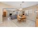 Open dining room adjacent to the living room at 16170 W Port Royale Ln, Surprise, AZ 85379