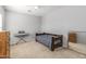 Small bedroom with a twin bed and keyboard at 16170 W Port Royale Ln, Surprise, AZ 85379
