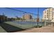 Community tennis courts with chain link fencing at 7910 E Camelback Rd # 502, Scottsdale, AZ 85251