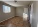 Simple bedroom with tiled floor and neutral walls at 2417 W Osborn Rd, Phoenix, AZ 85015