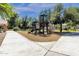 Modern playground with a slide and climbing structure in a park-like setting at 3574 E Glacier Pl, Chandler, AZ 85249