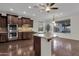 Modern kitchen with island, stainless steel appliances, and granite countertops at 3574 E Glacier Pl, Chandler, AZ 85249