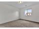 Bright bedroom with carpeted floor and a window at 3574 E Glacier Pl, Chandler, AZ 85249