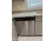 Stainless steel dishwasher in a kitchen with gray cabinets at 7313 S 17Th Dr, Phoenix, AZ 85041