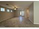 Living room with tile floors and neutral-colored walls at 7313 S 17Th Dr, Phoenix, AZ 85041