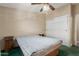 Full-size bed and ample closet space in this bedroom at 2400 E Baseline Ave # 201, Apache Junction, AZ 85119