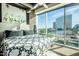 King size bed in a bedroom with city views at 1 E Lexington Ave # 410, Phoenix, AZ 85012