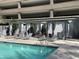 Private cabanas and lounge chairs by pool at 1 E Lexington Ave # 410, Phoenix, AZ 85012