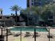 Community pool with plenty of lounge chairs at 1 E Lexington Ave # 410, Phoenix, AZ 85012