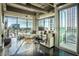 Spacious living room featuring hardwood floors and floor to ceiling windows at 1 E Lexington Ave # 410, Phoenix, AZ 85012