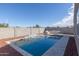 Inviting rectangular pool with a water feature at 17412 W Sunnyslope Ln, Waddell, AZ 85355