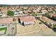 Aerial view showcasing home's backyard and surrounding area at 16001 W Huron Dr, Sun City West, AZ 85375