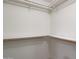 Well-lit closet with double hanging rods and shelving at 7402 E Carefree Dr # 209, Carefree, AZ 85377