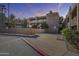Exterior view of the building with parking and landscaping at 7402 E Carefree Dr # 209, Carefree, AZ 85377