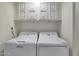 Stackable washer and dryer in a convenient laundry closet at 7402 E Carefree Dr # 209, Carefree, AZ 85377