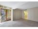 Bedroom with carpeted floors and access to a patio at 7402 E Carefree Dr # 209, Carefree, AZ 85377