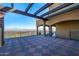 Checkered-tiled patio with pergola and mountain views at 9127 N Vista Verde N Ct, Fountain Hills, AZ 85268