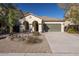 Beautiful curb appeal with a two car garage at 42488 W Lucera Ct, Maricopa, AZ 85138