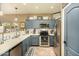 Well-equipped kitchen with stainless steel appliances at 13349 N 87Th Ln, Peoria, AZ 85381