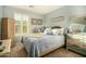 Bedroom with a queen bed and coastal-themed decor at 13349 N 87Th Ln, Peoria, AZ 85381