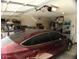 Two-car garage with shelving and ample storage space for your car at 4506 E Lone Cactus Dr, Phoenix, AZ 85050