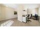 Home office space with built-in desk and shelving at 28629 N Zircon Ct, San Tan Valley, AZ 85143